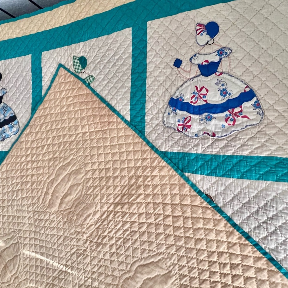 Elegant Cream and Teal Quilted Blanket